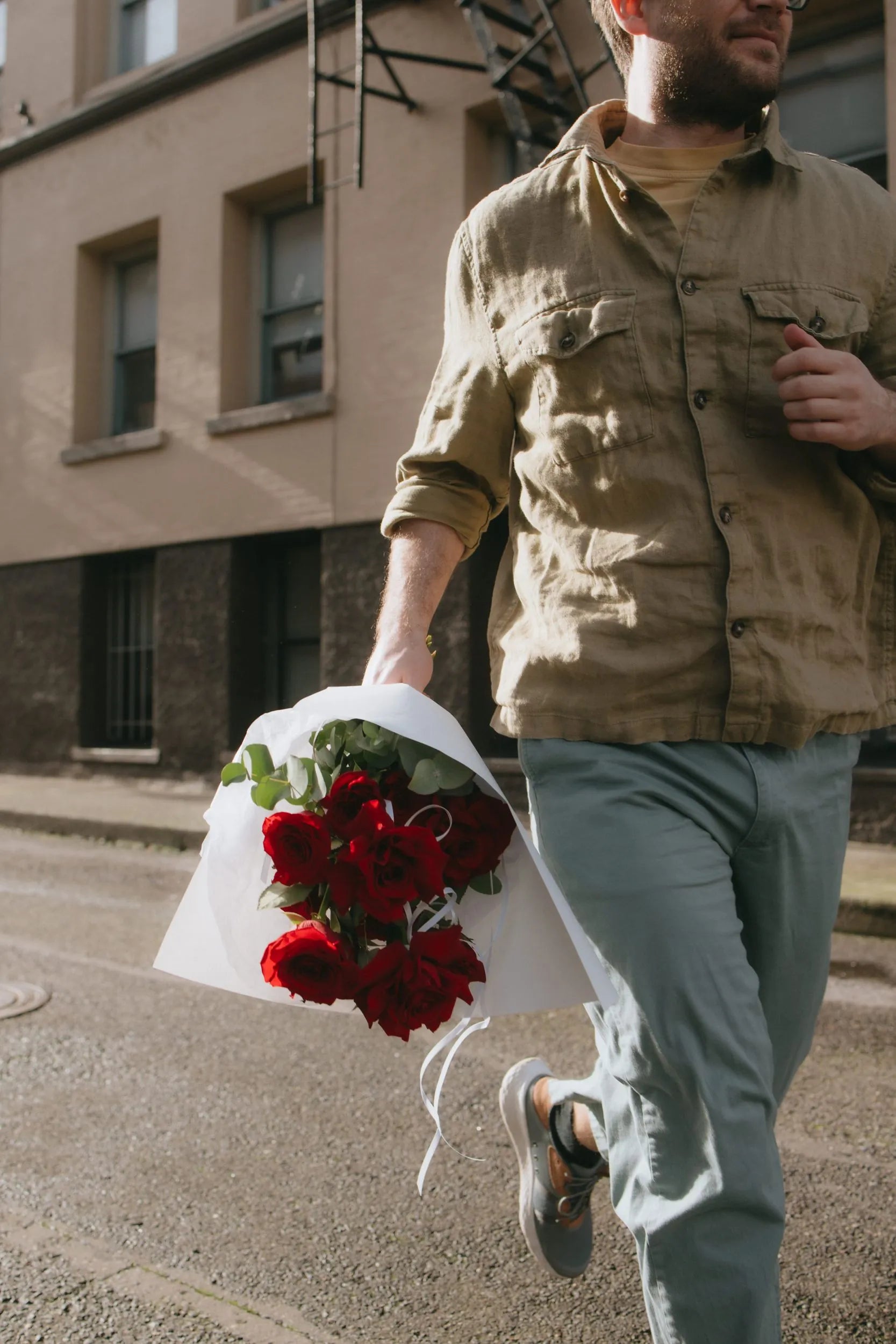 Valentine red roses bouquet delivery on the streets of Portland