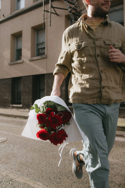 Valentine red roses bouquet delivery on the streets of Portland