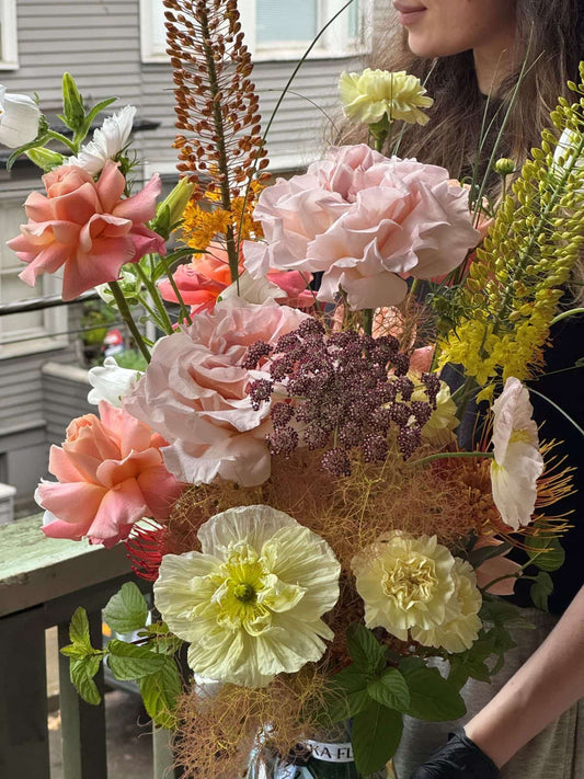 Close-up of Aloha Aina bouquet with peach luxury roses, icelandic poppies, foxtail lily, pincushion protea and chocolate lace flower, by Kvetka Flower Portland