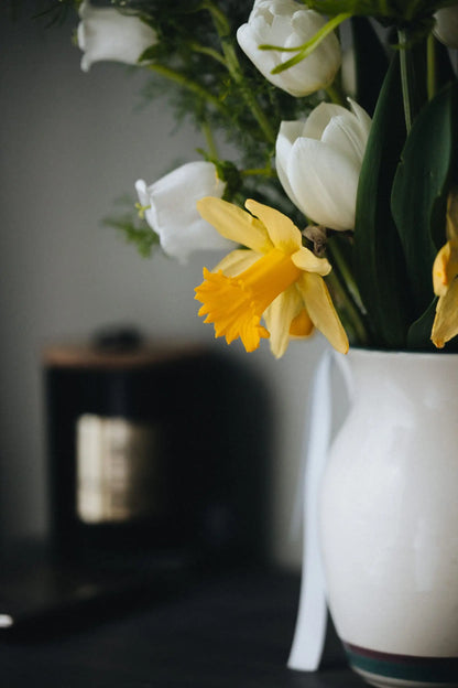 Custom flower bouquet medium yellow daffodil and white tulips close-up Portland florist Kvetka Flower