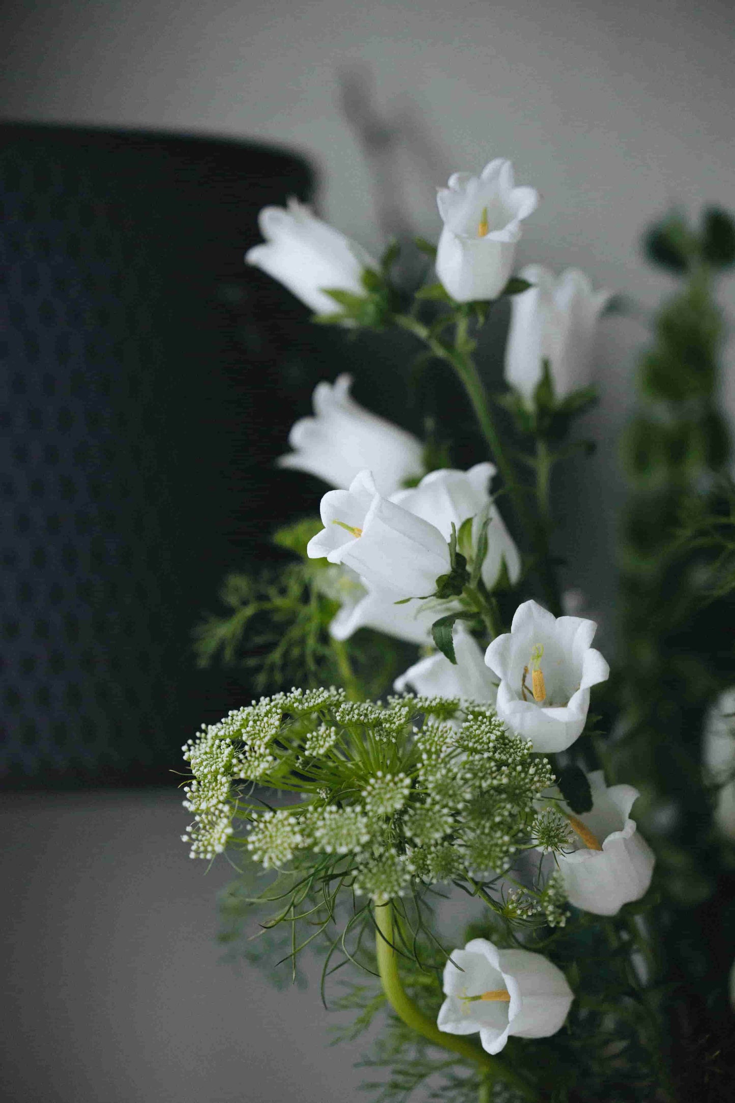 Close-up of white bellflowers and Queen Anne’s lace in bouquet – Kvetka Flower Portland florist