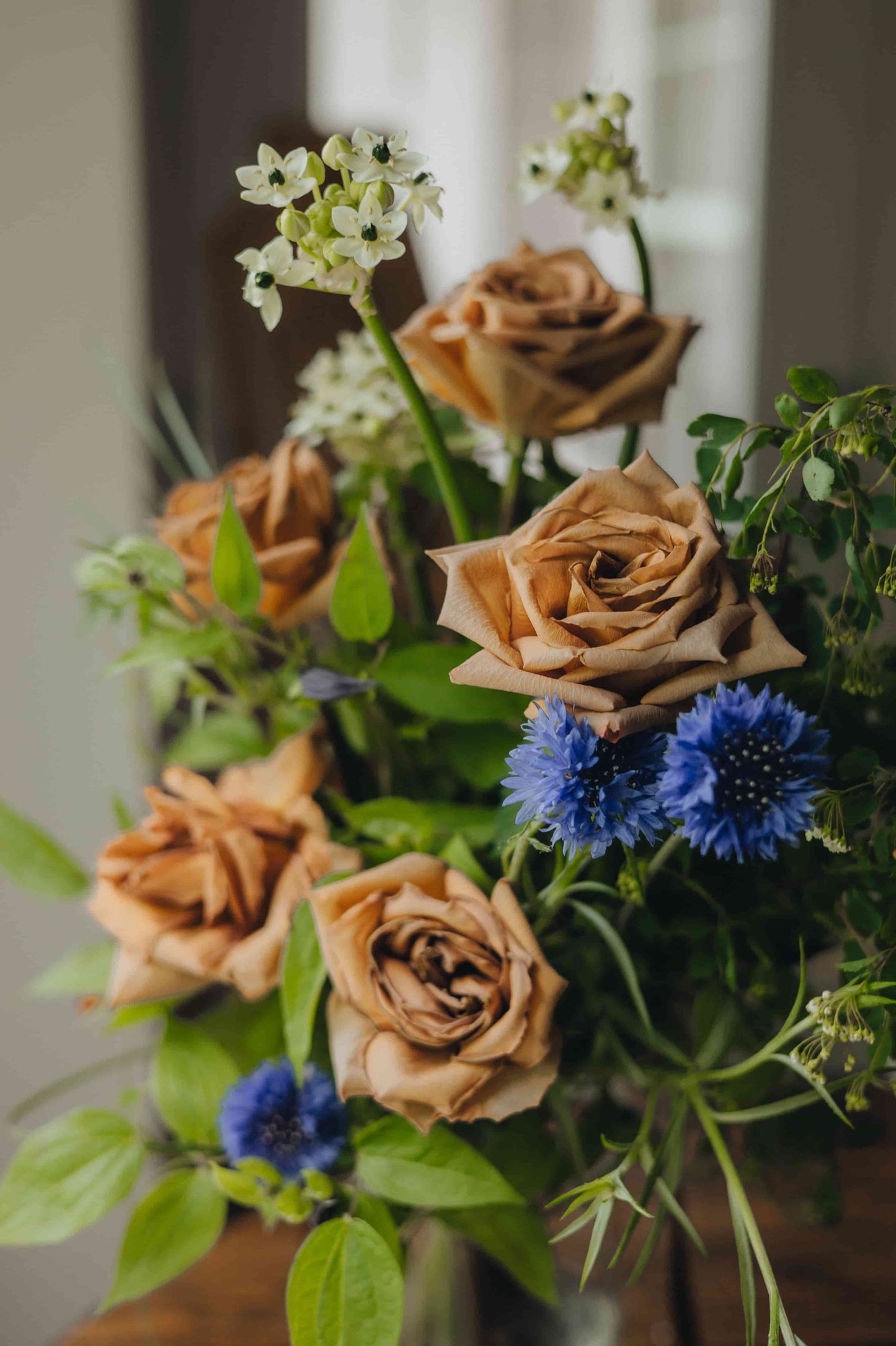 Full view of the Evening Letter bouquet in a clear vase — Kvetka Flower, Portland florist delivery
