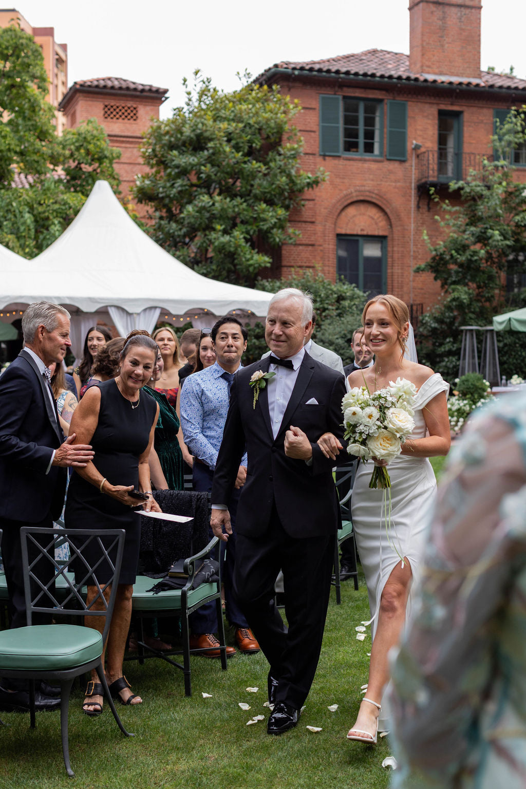 Bride walking down aisle with father holding white garden rose bouquet at The Town Club Portland by Kvetka Flower