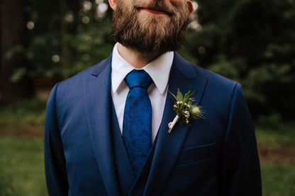 Couple and dog portrait in forest ceremony setup with white and green florals – by Kvetka Flower, Portland OR

