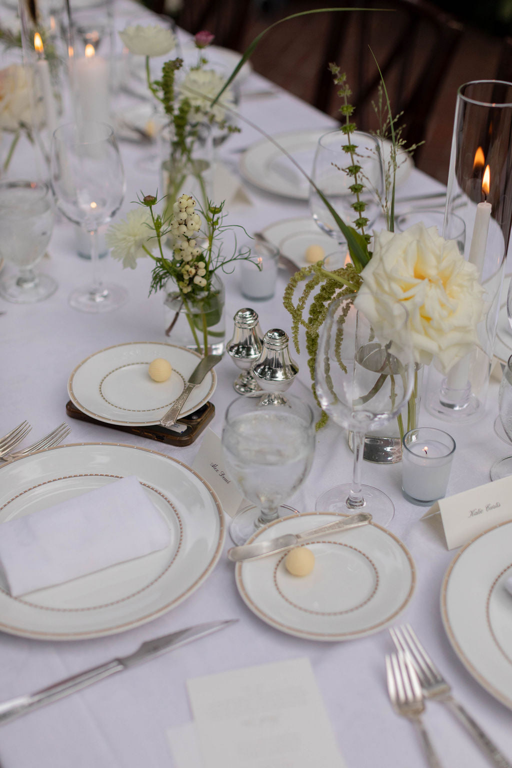 Elegant clear glass bud vase centerpiece detail with garden rose, white snowberry and trailing amaranthus by Kvetka Flower Portland