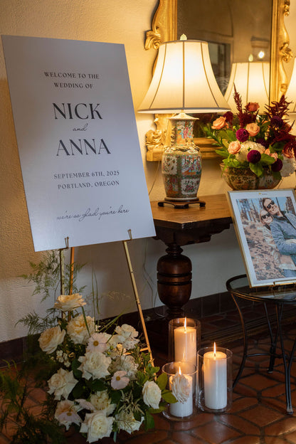 Indoor welcome sign with cream rose and burgundy dahlia floral arrangements at The Town Club Portland wedding by Kvetka Flower